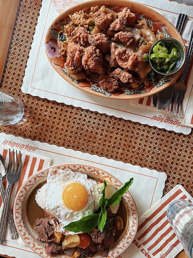 Two plates of mains on a table